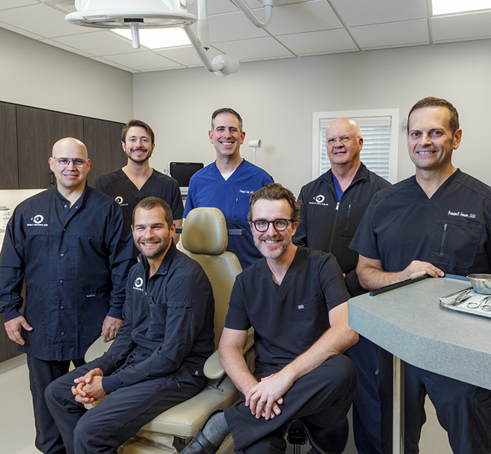 Team of smiling oral surgeons in Lancaster at Conestoga Oral Surgery