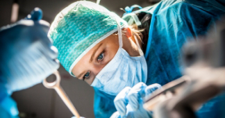 Oral surgeon performing a procedure on a patient